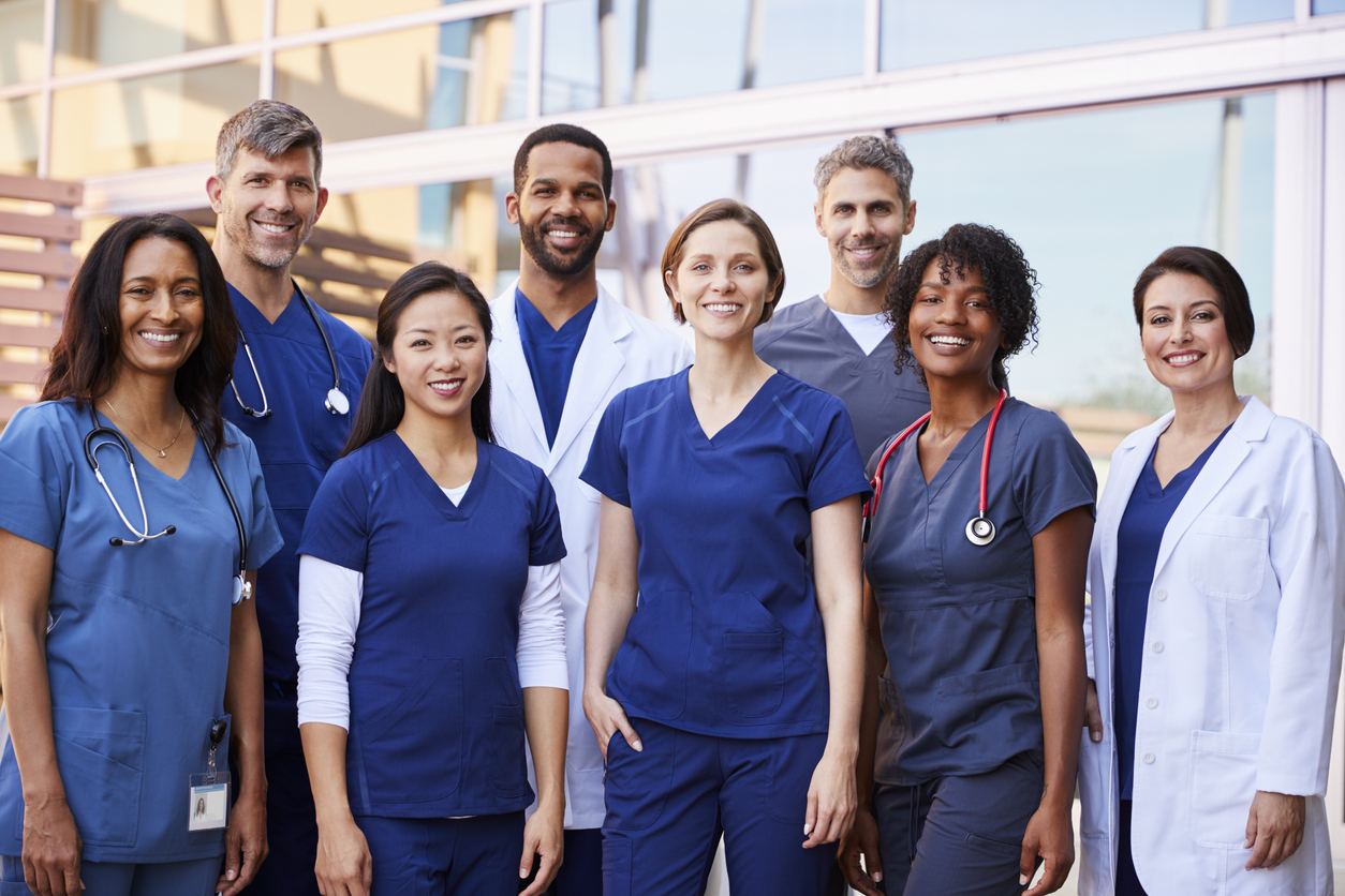diverse team of doctors standing together