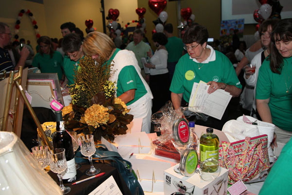 Silent auction at the 25th Silver Anniversary Children's Hospital Golf Classic