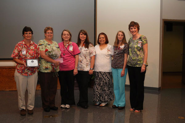 Some nurses who were presented a plaque for teir service at the 25th Silver Anniversary Children's Hospital Golf Classic