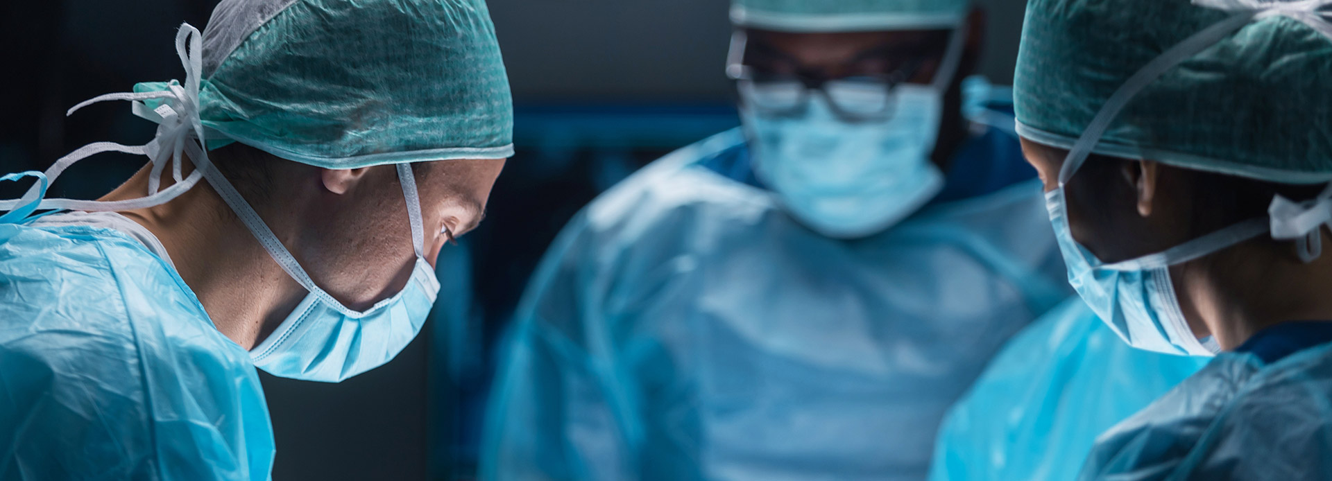 Surgeons at the operating table.