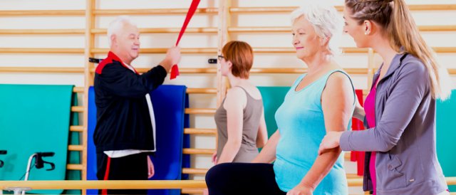 Elderly having a balance therapy