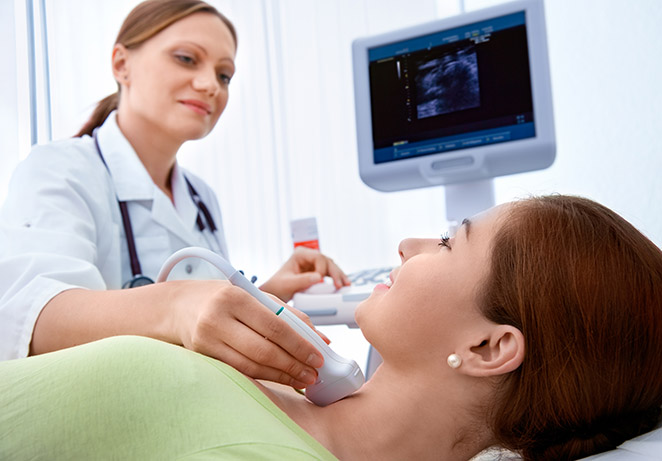 Woman is getting an ultrasound